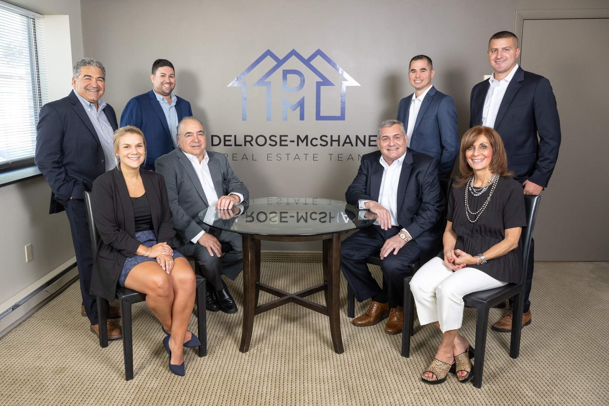 A photo of the real estate professionals on the DelRose McShane Team