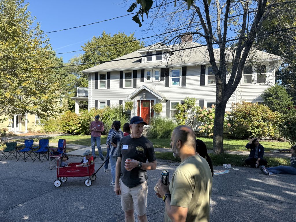Photo of a neighborhood gathering on Hurd Road in Belmont for the annual block party and cookout